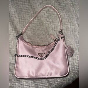 Pink Prada handbag with silver chain